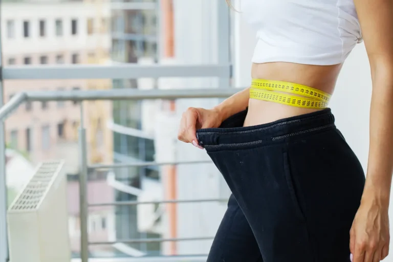 woman in oversize pants after weight loss diet co 2025 02 25 03 30 47 utc